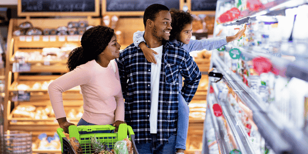 Family shopping in grocery store
